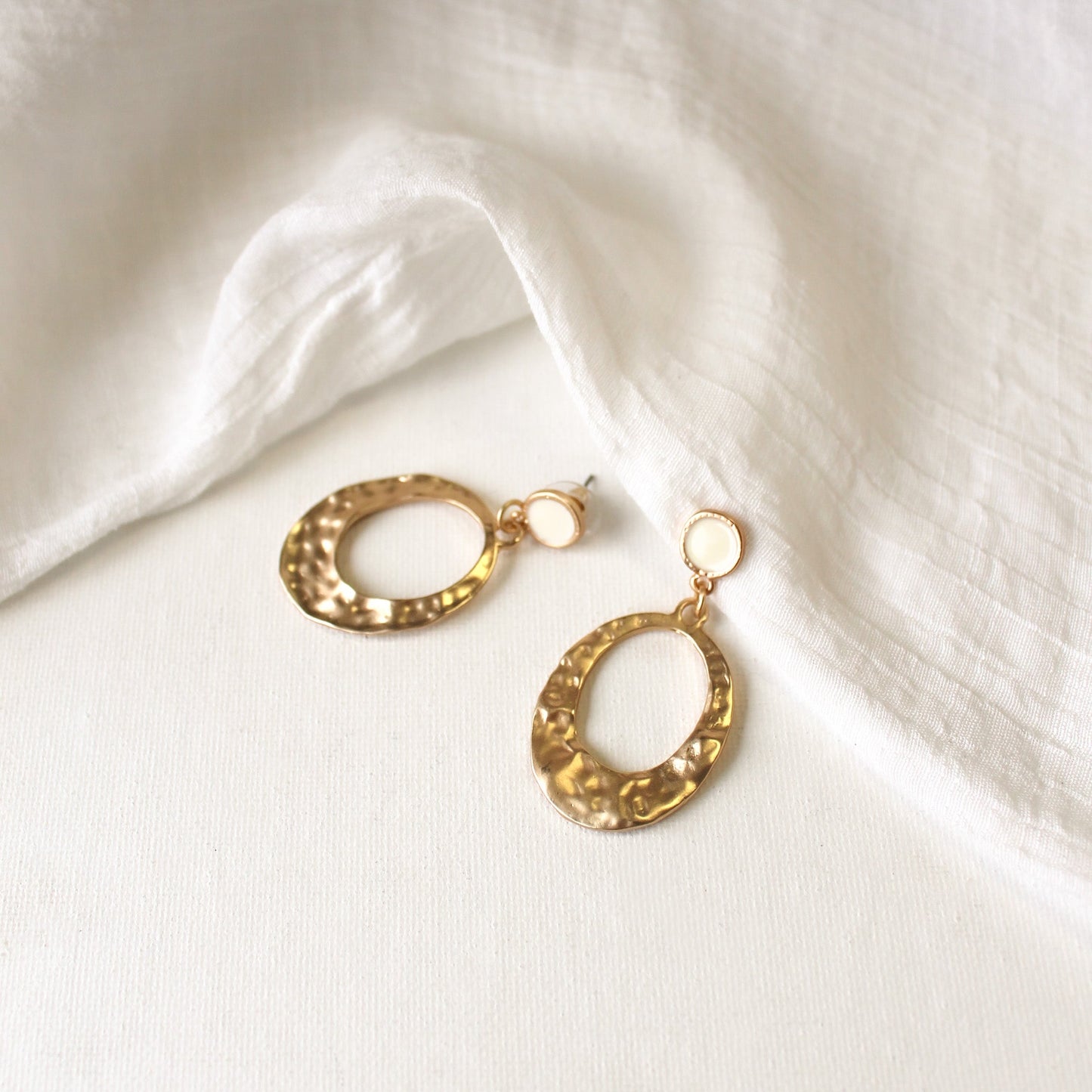 Dangling Oval Earrings | Hammered Gold with White Epoxy